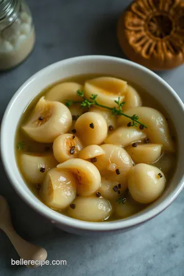 Tangy-Fresh Pickled Garlic: A Zesty Jar of Goodness presentation