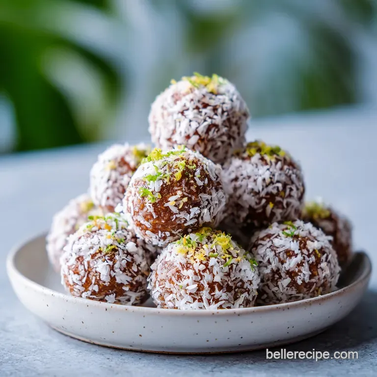 A swirl of golden Swedish meatballs and gravy on mashed potatoes, garnished with dill, in a porcelain bowl on a linen tabl...