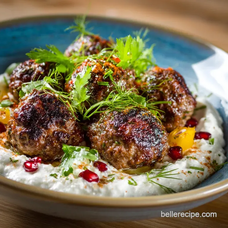 Ground Lamb Kofta with Creamy Whipped Feta and Zesty Mint Dressing presentation